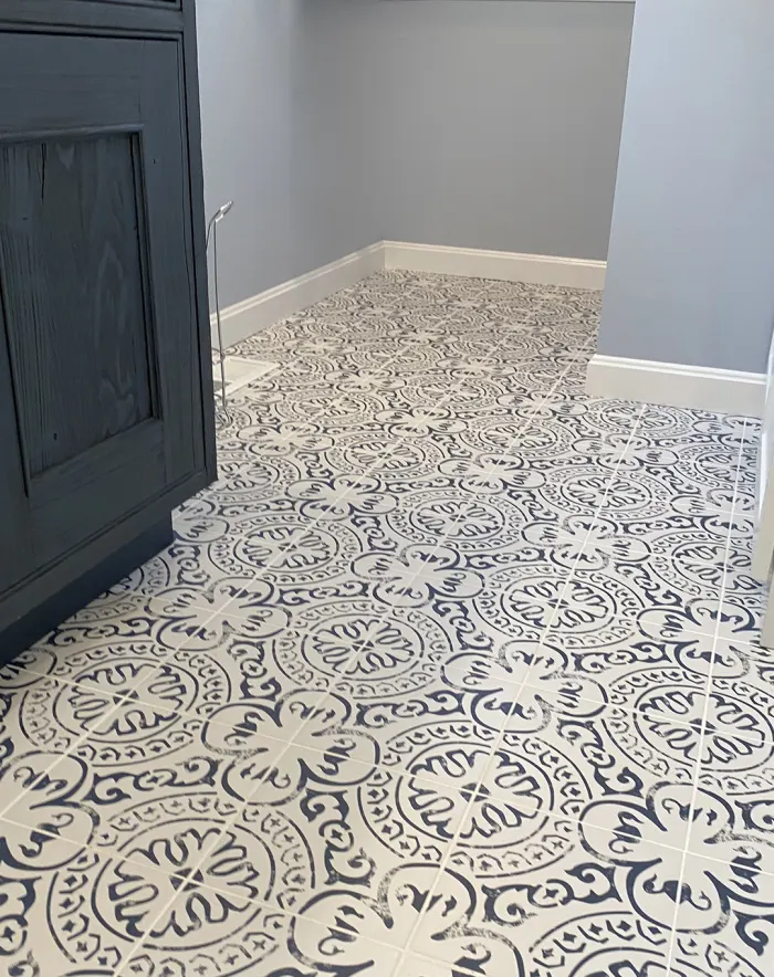 Bathroom with patterned tile floor